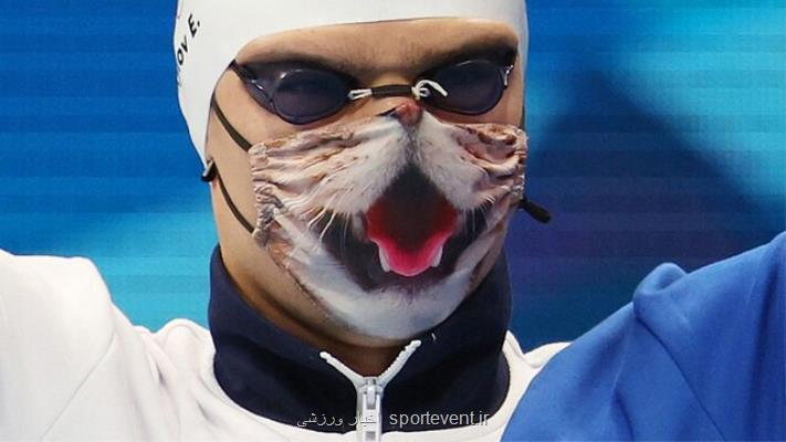 به ورزشكار روس اجازه داده نشد با ماسك گربه روی سكو برود!